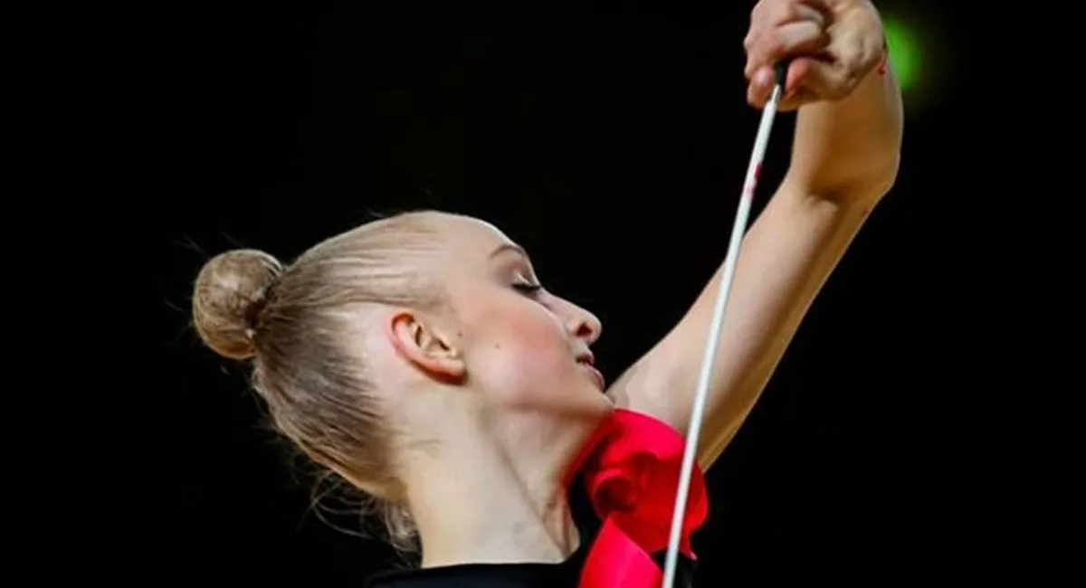 Она сказала да: звезда украинской гимнастики обручилась с китайским спортсменом (фото) - today.ua