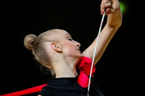 Она сказала "да": звезда украинской гимнастики обручилась с китайским спортсменом (фото)