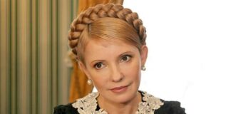 В трехцветном пиджаке и с молодежной прической: Юлия Тимошенко выступила на публике в новом образе - today.ua