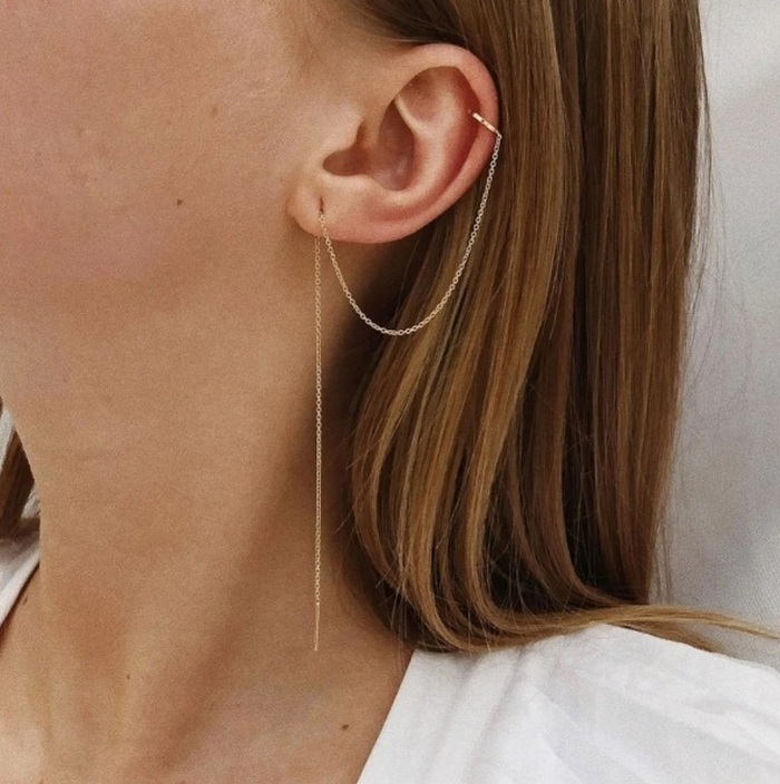Нестандартний пірсинг вух: фотоприклади цікавих рішень, якщо вже є пара сережок