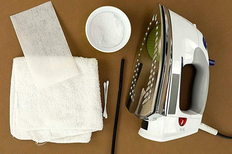 Названы два простых способа очистить нагар с утюга с помощью соли или соды